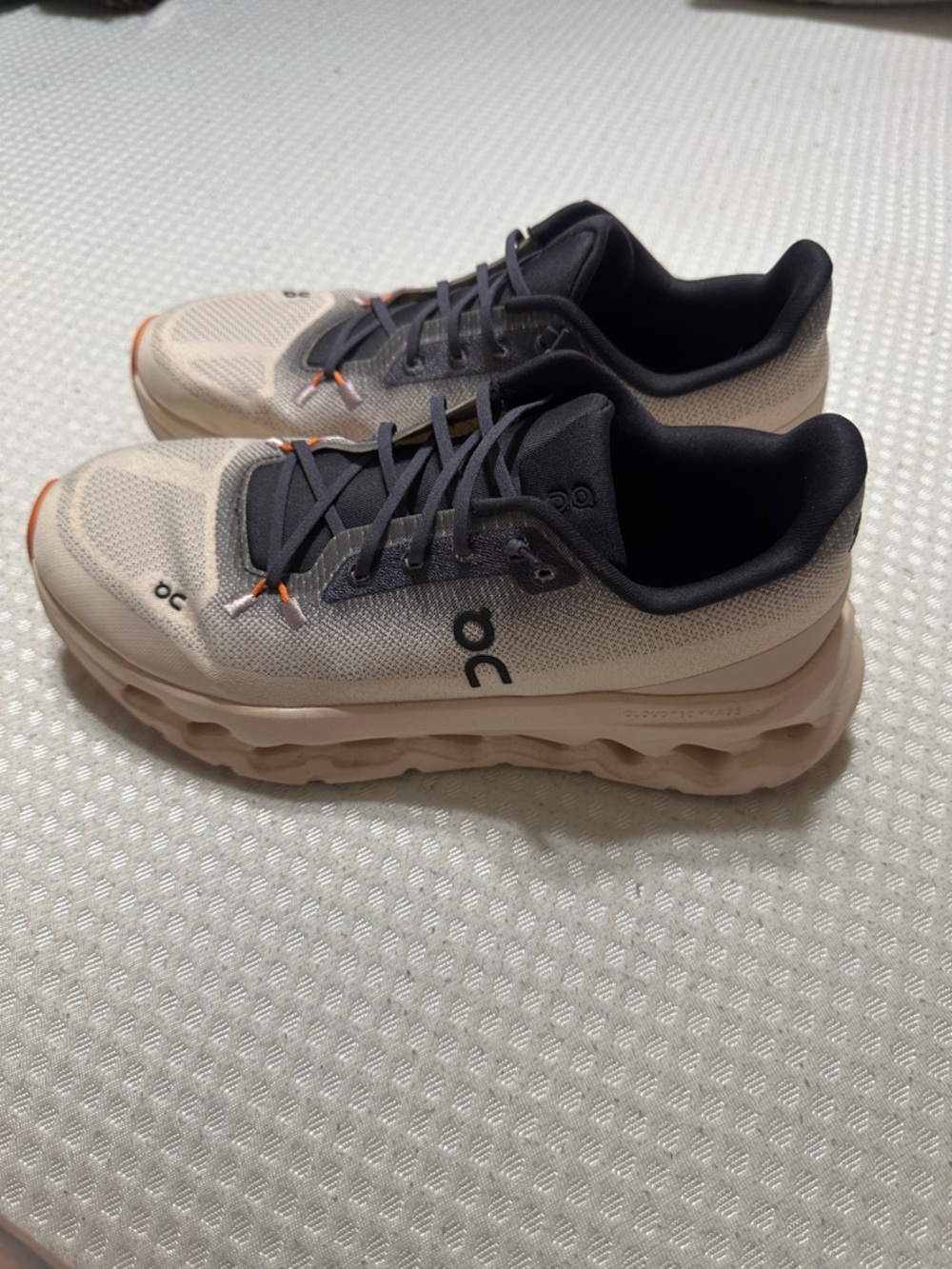 On Running Cloudnova Women’s Sneakers in Beige and Black with Orange Accents